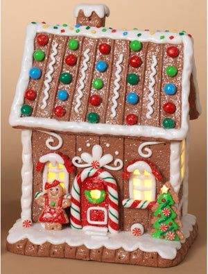 7.5-Inch Light Up LED Christmas Faux Gingerbread House Figurine with Woman and Candy Accents – Prebuilt Lighted Village Decoration – Xmas Tabletop Home Decor